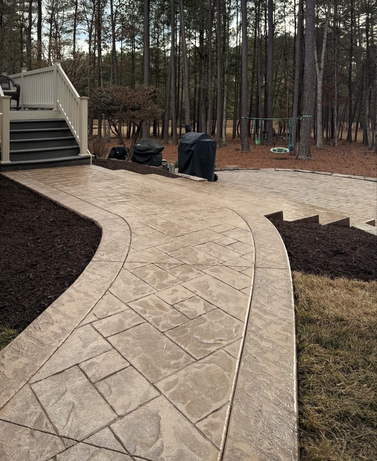 Completed stamped concrete walkway and patio